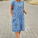 Eliška - Letní šaty s kulatým výstřihem a krásným potiskem 